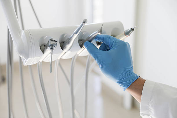 Professional Teeth Whitening technician working in Hamshire, TX